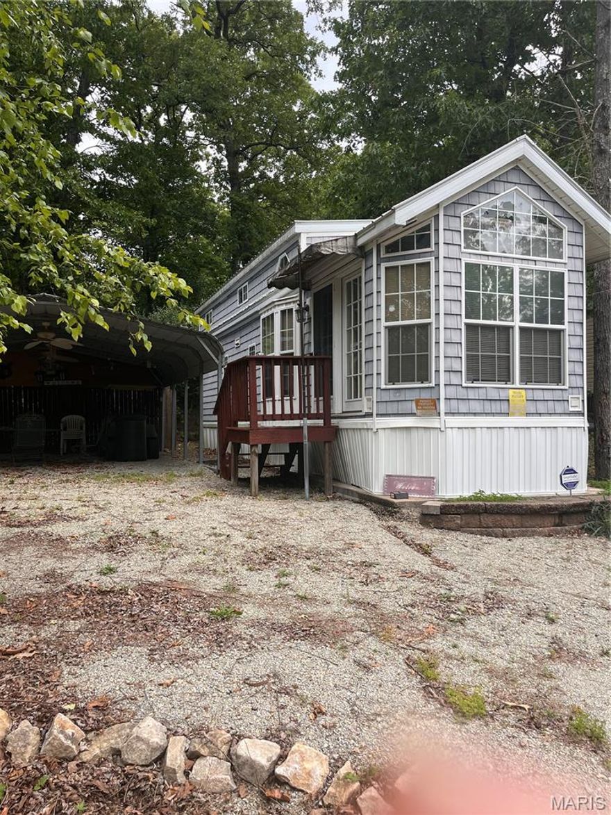 Escape to lake life with this charming fully furnished tiny home tucked inside the desirable Goose Creek Lake community! Situated on a level lot just moments from the beach, boat ramp, pool, rec hall, playground, and snack bar, this cozy retreat is the perfect weekend getaway, vacation property, or low-maintenance full-time residence. Inside you’ll find an open-concept living space with 1 bedroom, 1 full bath, 2 half bedrooms located upstairs, air, electric forced-air heat, and a comfortable layout designed to maximize every square foot. All furnishings stay, making this property move-in ready so you can start enjoying lake living immediately. Outside features include a covered 2-car carport, storage shed, gravel drive, and easy access to all community amenities. Property is serviced by shared well and shared septic systems. Affordable, easy to maintain, and packed with recreational opportunities — this Goose Creek gem is ready for summer fun, fishing weekends, or peaceful country living near the lake! Also, the neighboring twin property is also available for purchase, offering a unique opportunity for additional space, expanded use, or potential investment property used as a rental property. The possibilities are endless!