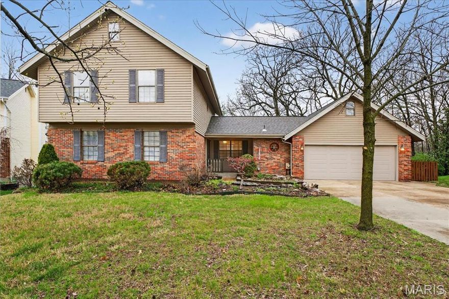 Don’t miss this 1.5 story with main floor primary bedroom & main floor laundry located in a quiet cul-de-sac! You’re greeted with great curb appeal including a partial brick, covered front porch and lots of extra parking in the elongated driveway. The foyer takes you to a 2-story great room with floor to ceiling brick wood burning fireplace, tons of windows for an abundance of natural light and original wood beamed ceiling. Large open kitchen and breakfast room with tons of cabinets, garden window, built in microwave and stove, electric cooktop, and pantry. All appliances to stay including the washer/dryer in the main floor laundry room with access to the 2 car garage. The spacious main floor primary bedroom includes an en-suite with dual sinks and full shower. An open spindle staircase takes you upstairs to two additional bedrooms and a full bath. On your way to the lower level you’ll find a half bath with pedestal sink and then a partially finished lower level with walk out. Plenty of storage space as well! Enjoy entertaining on the expansive wood deck with patio below (shed to stay) and yard backing to trees. Recent updates include siding and roof in 2025, HVAC and water heater also approximately a year old.