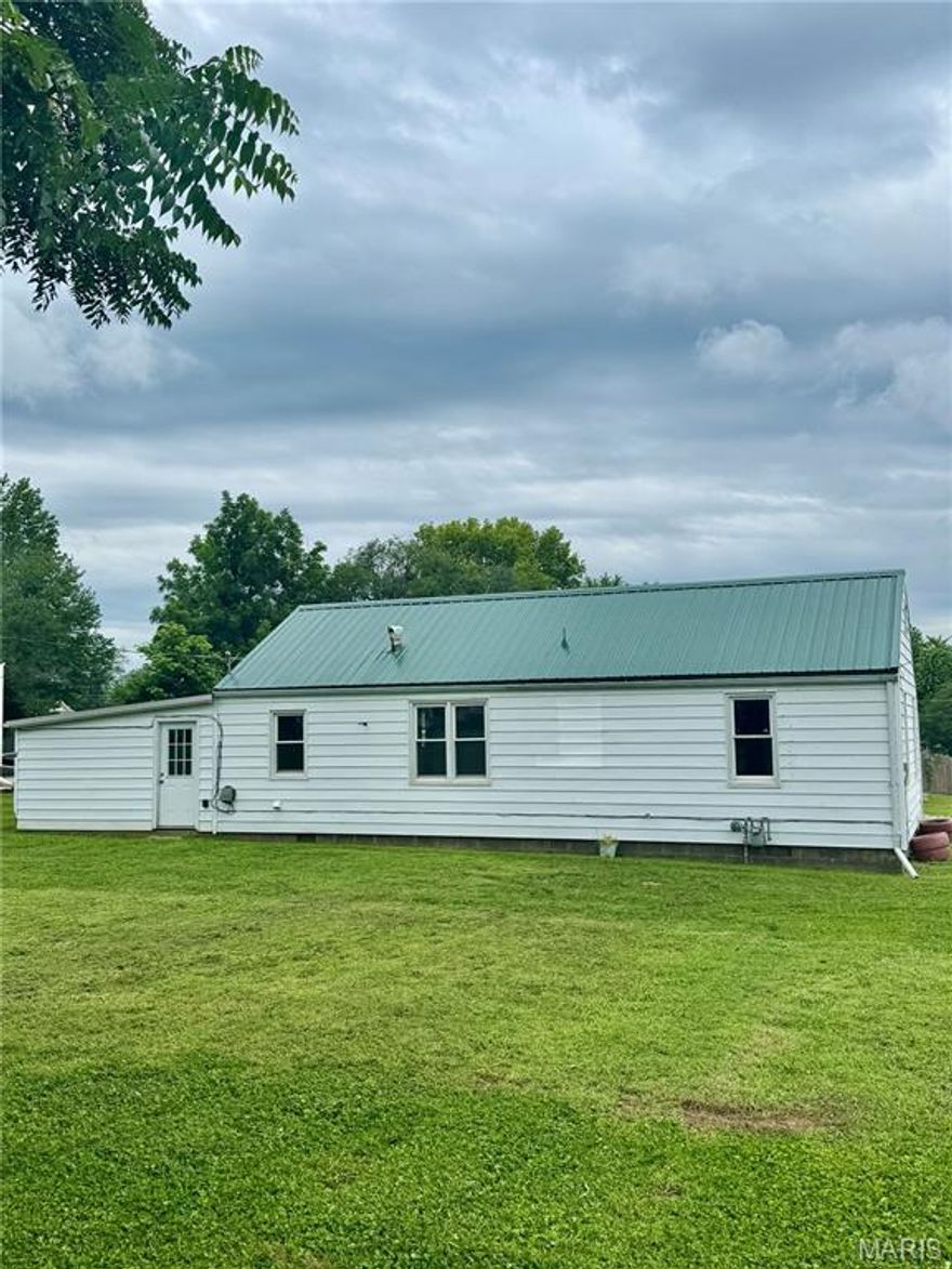 This move-in ready home is located in one of Palmyra’s most desirable neighborhoods. Recent updates include wall insulation, new drywall, and energy-efficient storm windows—ideal for year-round comfort and efficiency. Situated on a spacious lot, the property boasts two mature shade trees, including a majestic black walnut. The detached garage features newly poured concrete and fresh drywall, offering the potential to convert it into a third bedroom or a great flex space. The home is topped with a durable metal roof built to last a lifetime. Don’t miss this opportunity—schedule your showing today!