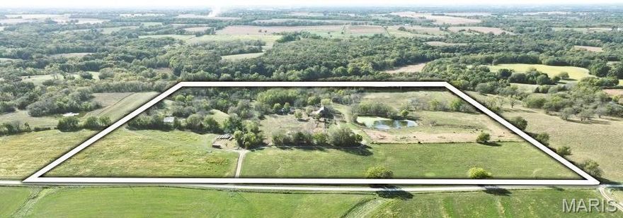 This secluded 44.37-acre tract is currently used as a cattle farm and is tucked away at the end of a dead-end road, offering privacy and a peaceful rural setting. Improvements include an older livestock barn with rural water and electric, along with a newly installed water line and meter. The property features two ponds that provide water for livestock and wildlife, as well as some high-tensile fencing already in place. Well-suited for agricultural use, grazing, or those seeking a quiet country property. Additional acreage available totaling 98.09 acres.