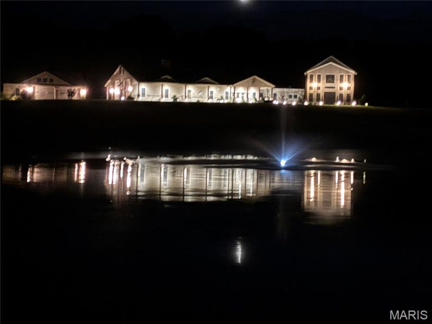 Here is a rare opportunity to own 39.6 acres just outside Jackson city limits. Located behind the Carolina Oaks Subdivision, this presents a great opportunity for both home buyers and investors. This home offers unique custom features, including brick archways, brick tile flooring, a gorgeous Brentwood natural stone bar, and pecky pecan kitchen cabinetry. It has five bedrooms, an office, three full bathrooms, and two half baths. In the living room, you will find a 28-foot vaulted ceiling with an all-natural stone fireplace. The primary en-suite is located on the main floor and offers a stunning arched tile shower and a separate tub.  The home is set up for a complete mother-in-law suite with additional laundry hookups. The vast views from the back 12 acres offer beautiful building sites. The well has been certified to serve up to 14 additional residences! The property includes approximately five acres of fenced pasture, approximately 15 acres of woods, 2 wildlife ponds, a creek, and a 2.5-acre stocked pond. The pond features a concrete and composite deck, a fountain, and a fishing pavilion with electricity.  The attached garage is oversized, heated, and cooled, with 12-foot-tall doors, and features a half bath. The detached oversized garage/shop is also heated and cooled, and is plumbed for an additional bathroom. Extensive concrete parking areas are ideal for an RV.