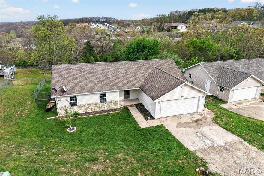 Charming three bedroom, two bath home offering comfort, convenience, and cozy living. This inviting property features a welcoming front porch, perfect for morning coffee or winding down in the evenings. Inside, you'll find a warm & cozy fireplace that creates the perfect focal point for relaxing nights at home. Step outside to enjoy a fully fenced backyard, idea for pets, play or entering. Located just minutes for Fort Leonard Wood and nearby shopping, dining and everyday essentials.