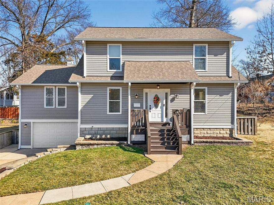 Welcome to 1330 Drayton Avenue—a beautifully updated and rare two-story home in the heart of Webster Groves, with not one, but TWO attached garages! This 3-bedroom, 3-bath charmer blends 1930s character with modern comfort. Enjoy hardwood floors, abundant natural light, and a spacious family room addition perfect for entertaining. The bright kitchen features stainless-steel appliances and solid-surface countertops, with main-floor laundry and a full bath for convenience. Upstairs offers three bedrooms and two full baths—an uncommon find in this neighborhood. Relax on the covered deck overlooking a private, landscaped yard. A new 2025 roof add value and peace of mind. Ideally located near Old Webster shops, restaurants, parks, and top-rated schools—this rare two-story gem is one you don’t want to miss! For virtual tour, click this link. https://vimeo.com/1166461600/b2f5e3f8c5?share=copy&fl=sv&fe=ci