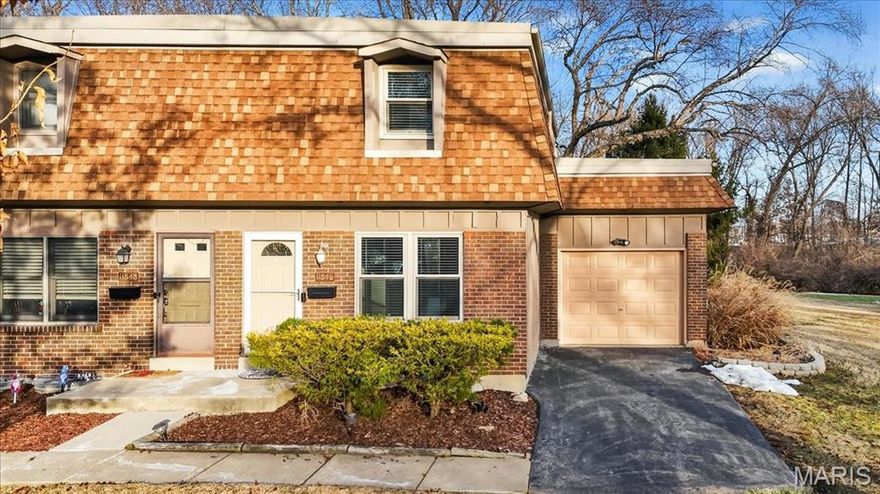 Welcome to this refreshed and move-in-ready townhome offering a functional layout, meaningful updates, and a great outdoor space backing to trees. Step inside to a bright living room with durable tile flooring—easy to maintain and perfect for everyday living. The adjoining kitchen and dining area create an effortless flow, with sliding doors that open to a fenced patio. With patio furniture included, this space is ready for morning coffee, evening dinners, or simply relaxing in your own quiet corner. Upstairs, you'll find two comfortable bedrooms and a full bath. Both bedrooms received new carpet (2024) and fresh paint (2026), giving the upper level a clean, updated feel. The finished lower level adds valuable bonus space—perfect for a family room, media area, playroom, or workout zone. The laundry facilities complete the lower level, and the washer and dryer stay, - an added BONUS for the new owner. Recent improvements include new window blinds, fresh paint on the main level, too, and a new garbage disposal - all completed in 2024. Enjoy community amenities including a pool and tennis courts, plus convenient access to nearby shops, dining, and local parks.