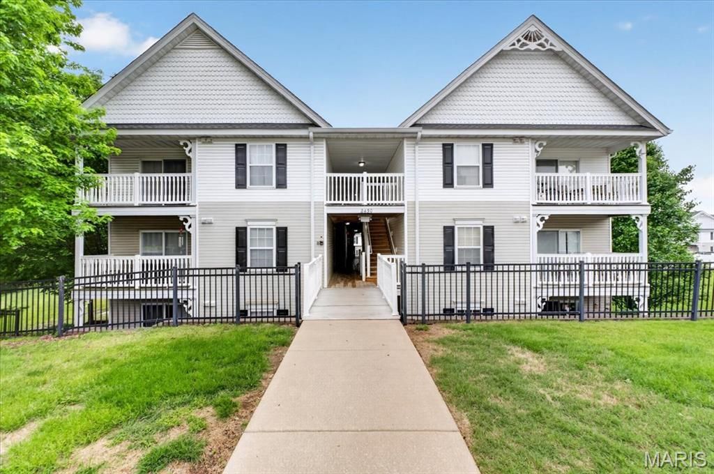 Photo of 2430 Tellicherry Drive #100D, Mehlville, MO 63125 (MLS # 26025389)