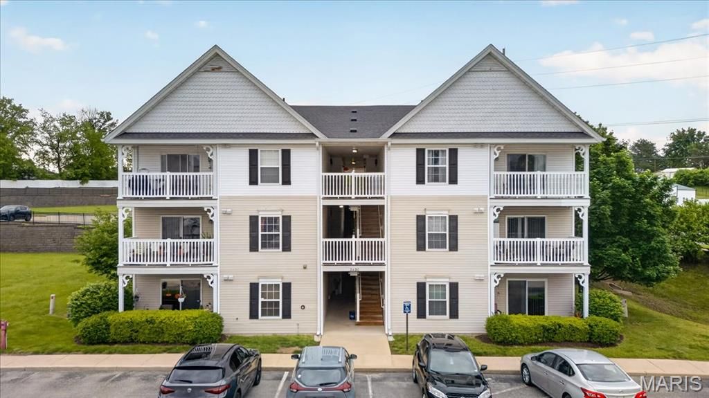 Photo of 2430 Tellicherry Drive #100D, Mehlville, MO 63125 (MLS # 26025389)
