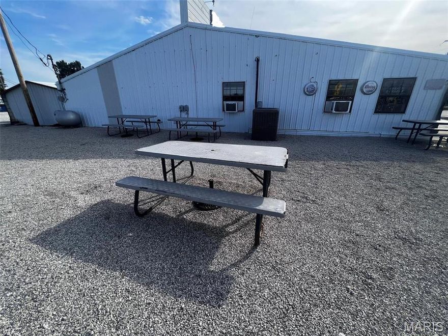 Excellent .94 acre commercial development potential. Easy access to both I-55 and the vibrant downtown of Perryville. Great location in a high traffic area and makes a nice site for any type of business including restaurant, office, or retail. 180 feet of road frontage. Nearby businesses include: Walgreens, Scooter’s Coffee, Duke Veterinary Clinic, and Perryville Tire.  Value-added site improvements have already been completed to bring this tract to a ready standard for any build-to-suit or custom prospect. Appropriate ingress / egress access. The property is zoned C-2 in a strategic location prime for new development with easy access to major thoroughfares. The current business in this property in not closed and will remain in business for one year from sale date. Location: City, Corner Location, High Traffic, Hwy/Interstate frontage.