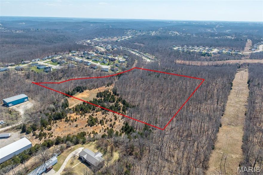 Prime 16.75 acre tract located within the St. Robert city limits, positioned at the end of Bonaire Drive with surveyed access extending to Bronco Road. This property offers strong potential for residential development, investment, or a private estate setting, all within minutes of Fort Leonard Wood, I-44, shopping, dining, and local amenities.

The acreage provides a versatile layout suitable for potential subdivision or multiple building sites. Nearby utility access may be available; buyer to verify availability of water, sewer, electric, zoning, and all development requirements. Property is being sold as one tract.

With continued growth and housing demand in the St. Robert and Waynesville area, this property presents an opportunity for builders, investors, or buyers seeking larger acreage in a convenient location.