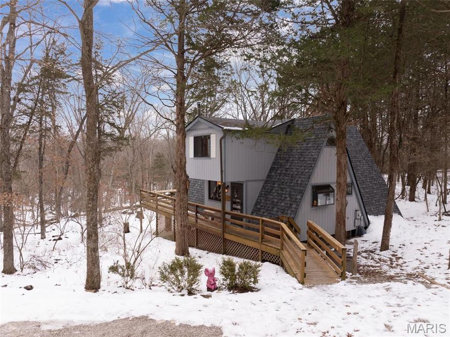 Absolute seclusion and privacy await in this beautifully updated 3-bedroom, 2-bath A-frame chalet with a bonus den, tucked away on a spacious 2.75-acre level, wooded lot. This off-water retreat offers the perfect blend of peaceful surroundings and convenient access, just a short walk to Lake Shadow, Whitetail, and Wunderblick beach on the 150-acre Lake Aspen.

Inside, both bathrooms and the kitchen have been updated with new flooring, appliances, vanities, and fixtures, along with all new ceiling fans and lighting throughout. Recent improvements also include a new roof and chimney, reinforced deck piers, expanded driveway with additional parking, and a newer sewer grinder beneath the chalet. The primary bedroom features an expanded closet, and a new washer adds to the home’s move-in-ready appeal. Unwind in the hot tub or entertain with ease in this private, nature-filled setting. Come check out this ideal Innsbrook getaway and rental opportunity.