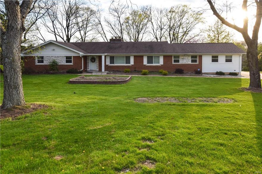 BACK ON MARKET - NO FAULT OF SELLER. LOCATION! LOCATION! LOCATION! All brick ranch home in sought after Chesterfield location on .74 Acre Lot with beautiful mature trees!  Also a great lot for tear down/rebuild. Gracious oak hardwood foyer leads to living room, dining room, and family room with large stone fireplace and beautiful view of the gorgeous wooded lot.  Kitchen features an impressive amount of cabinet and counter space, new stainless cook top, microwave, dishwasher and conveniently adjoins the breakfast room.  Spacious master bedroom suite with walk-in closet , over-size shower,  plus 2 additional bedrooms & hall full bath complete the main floor . Walk-out Lower Level features , huge picture windows, ample storage, rough-in fireplace, and laundry room. Water Heater 2015, Updated 200 Amp electrical panel, newer windows. Extensively .74 acre lot includes beautiful mature trees & over-sized 2-car garage.  1 year HMS Warranty included.