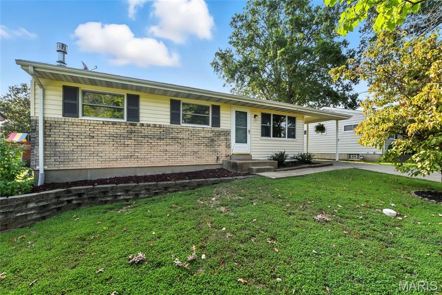 This charming house offers approximately 1,500 square feet of living space. Updated 3 Bedroom, 3 Bath home, is waiting for you & yours. The newer kitchen is a dream. Tiled back splash & Granite Counter Tops add charm & style. Built in Island/Breakfast Bar is a great set up for meals & entertaining. The open floor plan creates a seamless and spacious living environment, complemented by the warm ambiance of hardwood flooring throughout. New 200 Electric 07/25. Finished lower level offer a full bath, family room & sleeping area. Enjoy your morning coffee or favorite evening beverage on your patio as you watch the children & pets play in their level fenced yard. Off street parking with car port is an added bonus. Mehlville Schools.  Great Location! 3 Mins to Highway, Shopping, Restaurants & More! Mehlville Schools