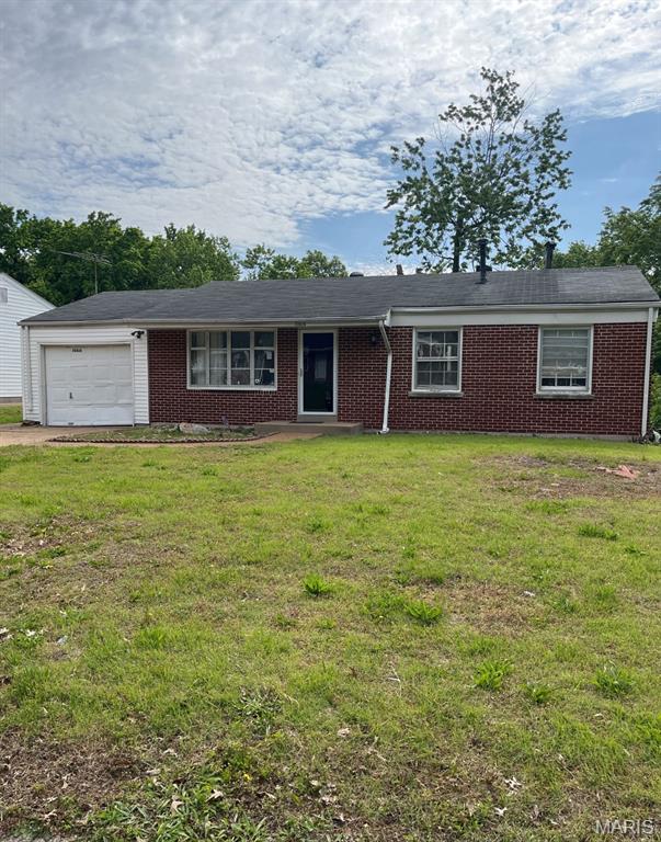 3 bed 1 bath ready for a new owner!  Nice home on a quiet street!  This home features a nice useable floor plan with a bonus room!  Close to main main roads and major highways making it easy to get around.  This home features a full basement with a walkout and an attached garage!  This is a must see property!