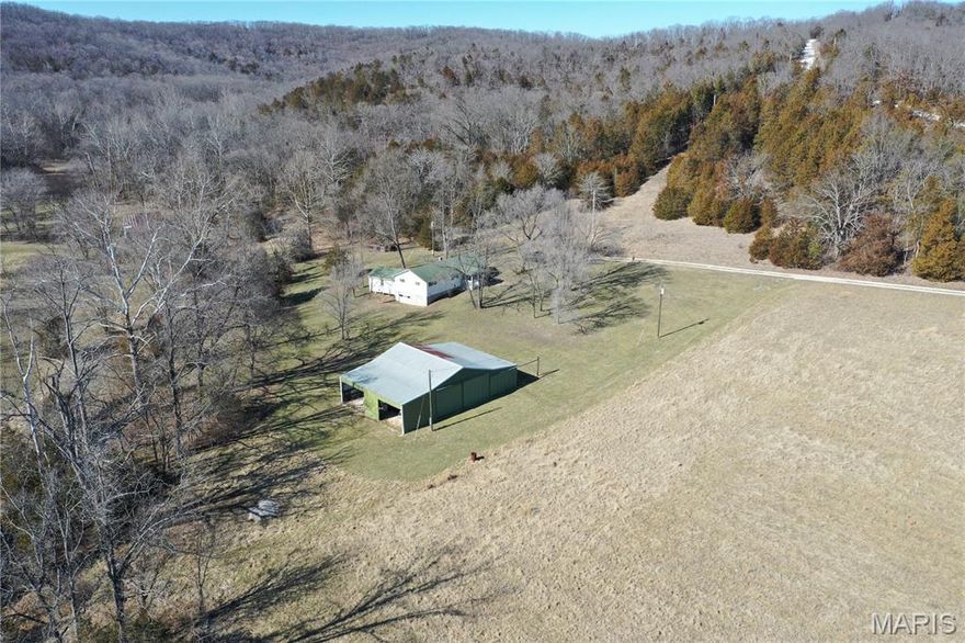 Discover the perfect blend of pasture, privacy, and potential on this beautiful 25-acre property in Montgomery County, located in charming Rhineland just minutes from Hermann. With open ground ideal for horses or a small farm, this property is perfectly suited for a hobby farm, homestead, or country retreat. A nice metal barn provides excellent space for livestock, equipment, or storage, while the 1960s ranch-style home offers a great opportunity for a fixer-upper project. Whether you’re looking to renovate for yourself or invest in rural property with potential, this home is ready for your vision. A creek gently runs along the western side of the property, adding natural beauty and a peaceful setting. With a mix of pasture and wooded areas, you’ll enjoy privacy, scenic views, and abundant wildlife right outside your door. If you’ve been dreaming of country living close to the conveniences, wineries, and attractions of Hermann, this is your chance to make it a reality.