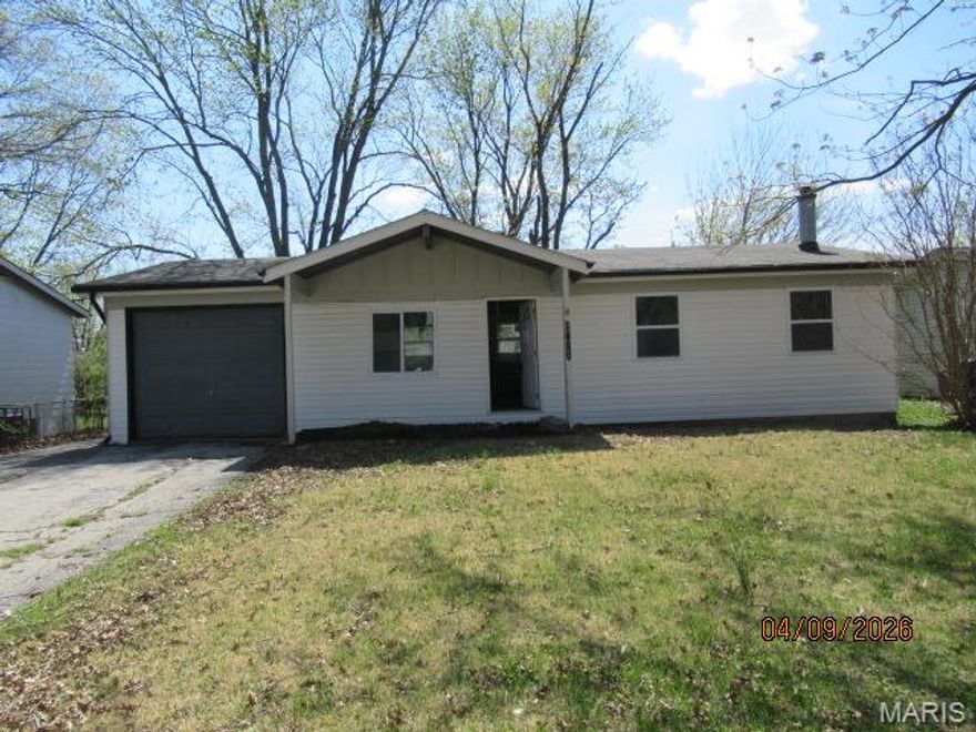Investors and Rehabbers! Opportunity is knocking! Ranch home needing a rehab. Family room in basement has a fireplace. Lots of potential here! Come take a look! Offered as-is/where-is. Cash or Hard Money loans only!