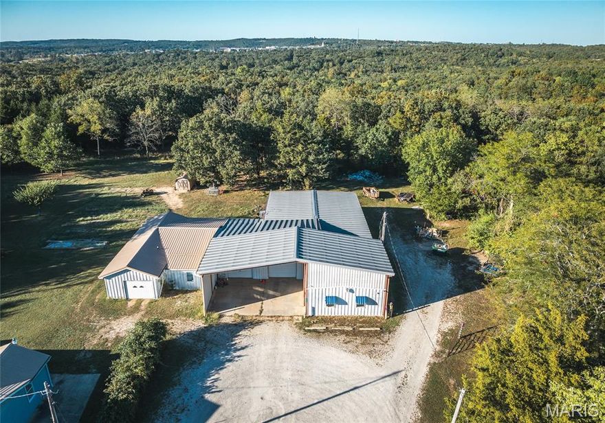 Excellent commercial opportunity! This 4,662 sq ft building sits on 1.5 acres and offers a great combination of warehouse and office space. Versatile layout ideal for a variety of business uses — distribution, service, or light manufacturing. Ample parking and room for expansion. Conveniently located with easy access to major roads and Rolla amenities.