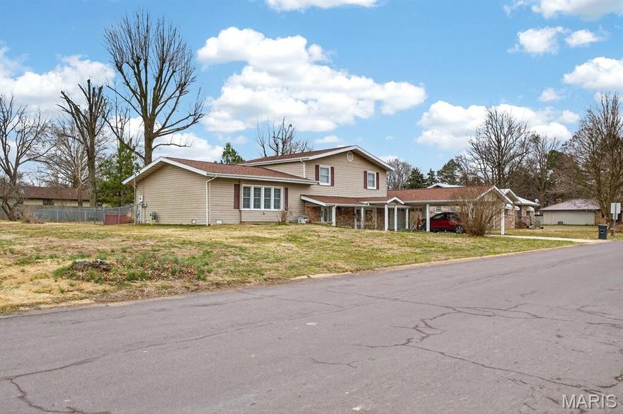 Welcome to this well-maintained 3 bedroom, 2.5 bath split-level home located in a great neighborhood with road frontage on Hovis Street. The home offers a flexible layout, with the lower level providing the option to serve as an unconventional fourth bedroom, home office, or additional living space -- whatever best fits your needs. This property has been thoughtfully cared for over the years, including annual preventative HVAC servicing and regular preventative pest control. The roof is approximately 5 years old with a single-layer design. The living and dining areas have been protected with soft floor covering to help preserve the flooring, and the kitchen features newer premium vinyl flooring that blends durability with style. You'll appreciate the generous storage and cabinet space throughout the home. Comfort is covered year-round with central heat and air, a cozy gas fireplace, and a vent-free heater for backup warmth when needed. The home also features a 200-amp breaker panel and may include a potentially transferable Choice Home Warranty for added peace of mind. Outside, the property offers excellent parking and storage options. A 2-car attached garage and covered carport are conveniently located at the front of the home, while a small shed and detached rear car or trailer covering provide additional protected space. The fenced backyard also includes a covered patio -- perfect for relaxing evenings or casual gatherings.