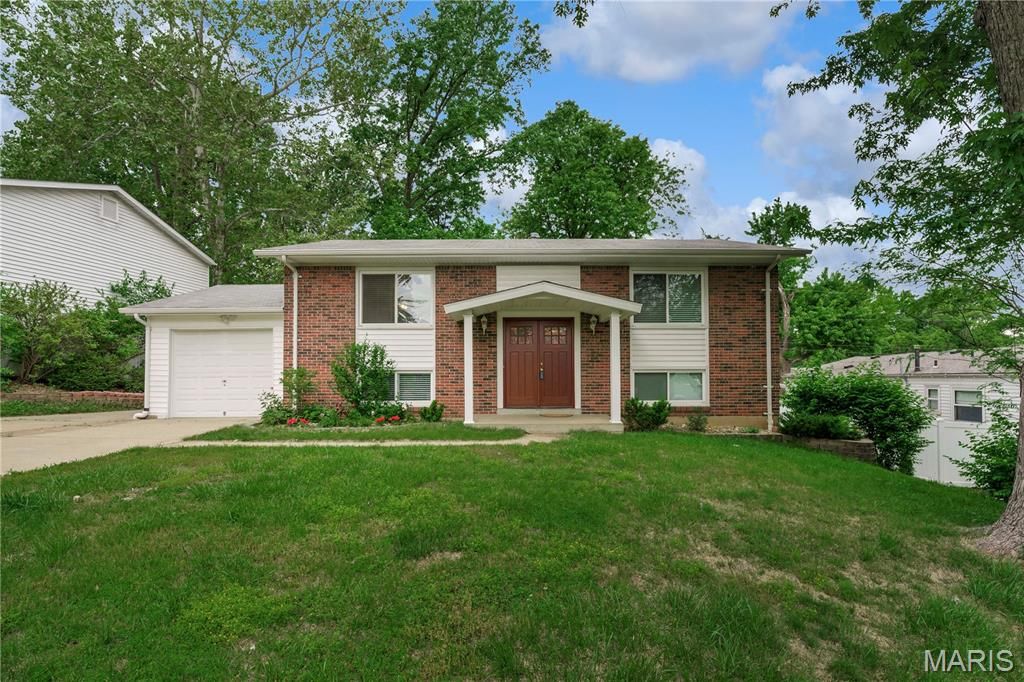 Photo of 1357 Glenstone Drive, Maryland Heights, MO 63043 (MLS # 26027424)