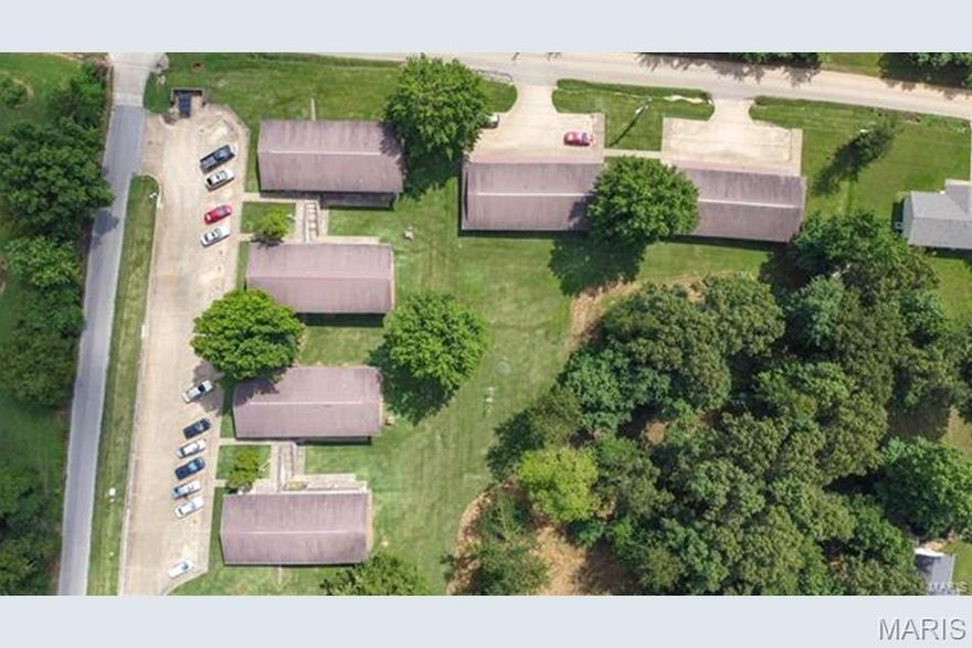 Investors Dream! 2.2 acres, 6 buildings with 24 apartment units available in this turn-key ready rental complex located in the quaint city of Doniphan. This complex is comprised with 8-1 bedroom units, 12-2 bedroom units and 4-2 bedroom units. All buildings are brick facade with concrete walkways and paved parking lot for tenants. This property is a HUD project with steady monthly income generated in excess of 23k monthly! Yes, that is correct, over 23K monthly gross income! There is a section 8 contract in place for all 24 units that is a for-profit contract, allowing owner to generate income! These for-profit contracts are atypical for section 8 housing, which makes this a rare and beneficial asset for the right buyer. With a property management company and property manager on sight that are willing to stay in place, let this be your next portfolio asset! Call today to schedule your private showing by appointment only. Listed at one million, seven hundred thousand $1,7000,000.