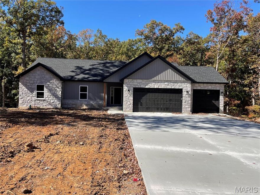 Welcome home to this under construction Avery model in Hickory Heits. The ranch home features 1734 sq ft 3 bedroom, 2 bath with walkout basement and large 3 car garage. The home comes loaded up with features and upgraded finishes. All pictures are of previously built home with similar finishes. This home is just getting framed so more details to come.