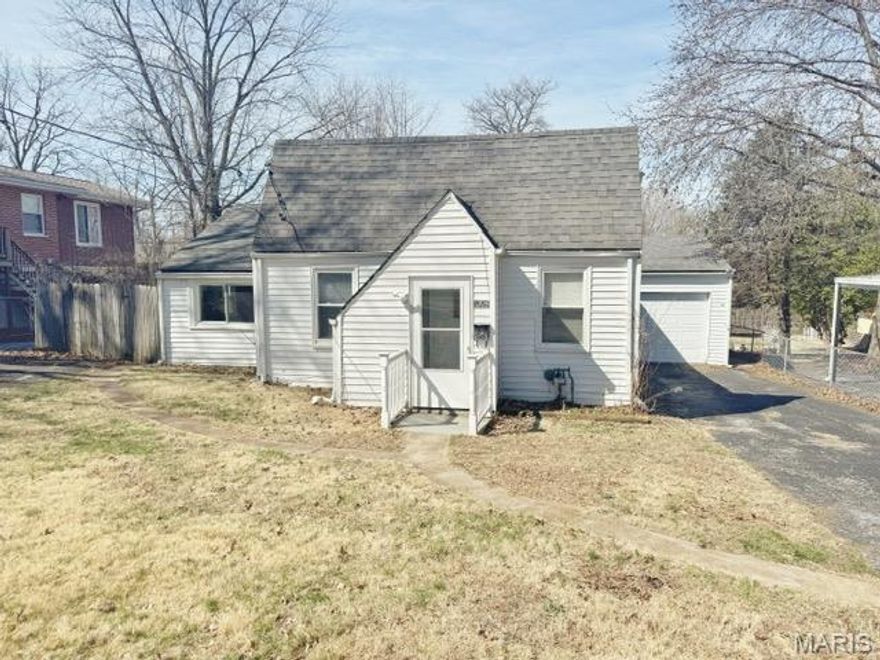 Charming and spacious, this St. Ann home is packed with updates and offers incredible flexibility—perfect as an investment property, rental, or owner-occupied residence. The interior features a neutral color palette throughout, creating a bright and welcoming atmosphere.

The updated kitchen is equipped with stainless steel appliances and flows seamlessly into the living spaces, all enhanced by tasteful finishes, newer laminate flooring, and vinyl windows. Newer water heater for added peace of mind.

In addition to the main living room, the home offers an expansive 15x21 rear rec room—ideal for entertaining or relaxing—with French doors that open to a deck and a level, fully fenced backyard.

Car enthusiasts or hobbyists will appreciate the oversized 22' x 25' garage, along with ample off-street parking. A partial basement provides extra space for storage or potential additional living area.

This move-in-ready home has it all—don’t miss your opportunity. Schedule your showing today!