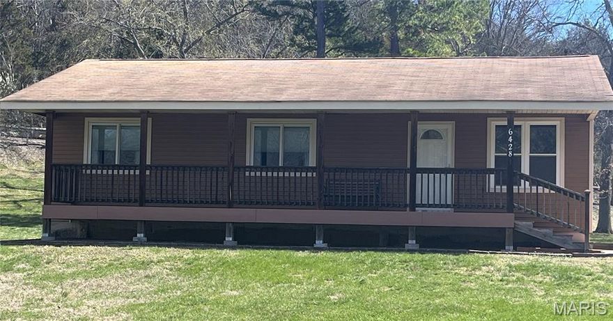 Bring us an offer & call this updated ranch - "home" for your summer entertaining. Enter this home from the composite front deck into 3 bedrooms w/1 1/2 baths. There are wood floors in the living room & all bedrooms. Kitchen & baths have ceramic tile flooring. The spacious main bath has a stacker w/d which are included. Kitchen offers plenty of cabinets w/pantry cabinet, island with "eat-up bar", Corian tops & accesses covered back patio (all kitchen appliances stay w/the home). Bedrooms have closet systems for helping you stay organized. Lower level is very clean, has partial finished area w/vinyl flooring & bookcase/shelves. There is a storage area w/shelves & dehumidifier which drains to sump pit.  The lower level has a walk up access to the covered patio on the back of the home - ready for your entertaining, grilling, etc. There is a detached 2+ car garage w/garage door opener & side passage door; also offering a 100 amp panel. The garage has an addition for more storage/lawn equipment, etc. The 3.7 acre wooded "park like" lot is located at the end of the street & is ready for your bonfires, yard games, etc. See seller disclosure & documentation for all the information on updates seller has completed since 2011 - (incl septic system, siding, windows, roof, electrical, plumbing, HVAC, Water heater, flooring, kitchen appliances, etc). Location close to shopping, restaurants, etc. Main street is paved/asphalt & driveway is concrete. Call to schedule your appt today.