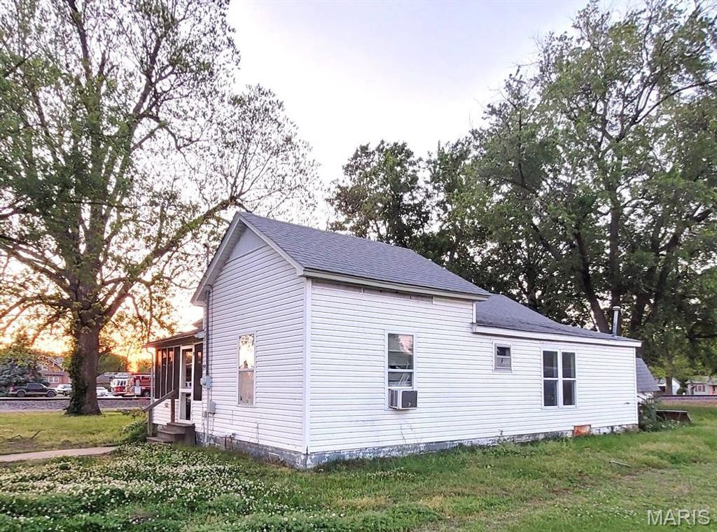 Photo of 410 E 3rd Street, Portageville, MO 63873 (MLS # 26024643)