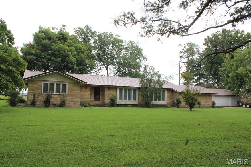 *PRICE REDUCED* This home will remind you of a picture straight out of the Southern Living magazine. It was built in 1964 and maintained by the same family until now. It was always well taken care of by the owner. It has a nice open dining room, kitchen, and family room. A formal living room/ dining area. 3 Bedrooms, 2 and a half baths, and 2 bonuses including a large game room with extra closet/ storage space. A walk in finished basement making those stormy nights just another night while staying safe in the comfort of your home. Full House Generator, Detached 2-3 car garage with an attached covered carport space. Shown by appointment only.