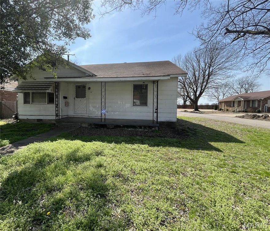A cozy home on a corner lot! 2 Bedrooms, 1 bathroom, a nice sized living room, kitchen, and a spacious laundry/utility room for extra storage. Would make a great investment property, first time home, or place to downsize. Lot size 50X200 Sold as is. Cash or Conventional Loan.