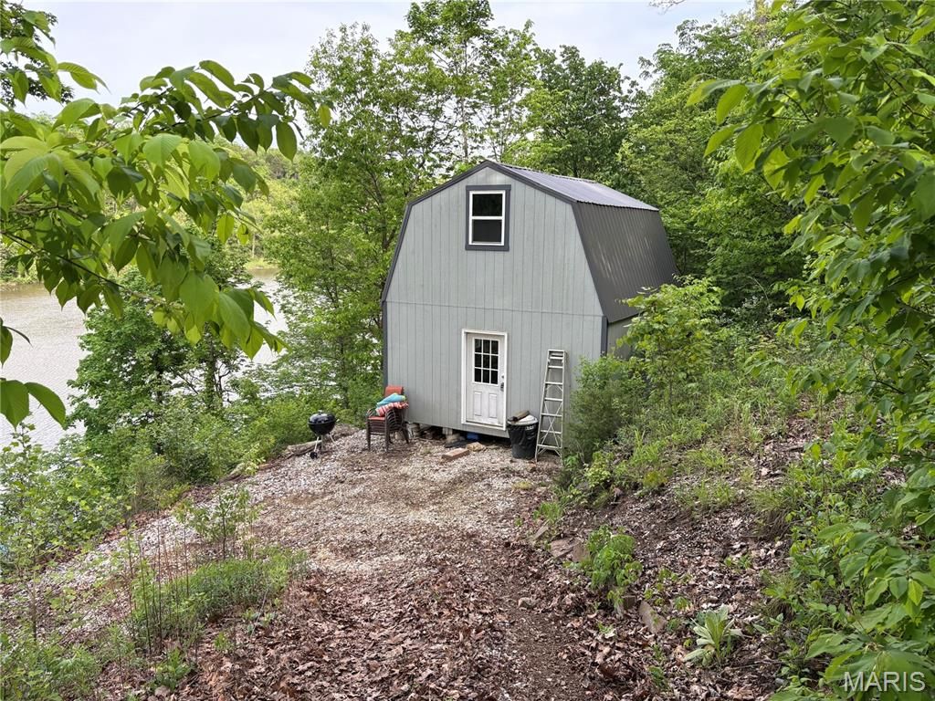 Photo of 29 Lake Trail, New Florence, MO 63363 (MLS # 26020593)