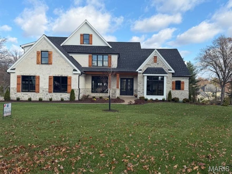 Gorgeous custom home just completed on a beautiful walk out lot located on a peaceful end of a cul-de-sac in Town & Country. Lot large enough for a pool as well. The entry foyer opens up to large living area with separate dining and study. Gourmet center isle kitchen with large breakfast area and solid surface counter, wolf appliances, sub zero refrigerator. The main floor primary suite is privately located in the rear of the home. The primary bath has large walk in tiled shower, soaking tub, and two separate vanity areas, and two large walk in closets. Main floor has 10'-12' ceilings thru out. Upstairs there are 4 additional bedrooms, 2 full baths, bonus room and 2nd floor laundry. The finished lower level has 10' basement pour,  two additional bedrooms and bath, office, spacious game room, wet bar, gym, and ample storage areas. Covered deck and patio perfect for entertaining. Convenient to Hwy 40/64, and close to both hospitals. This breathtaking home won't last long!