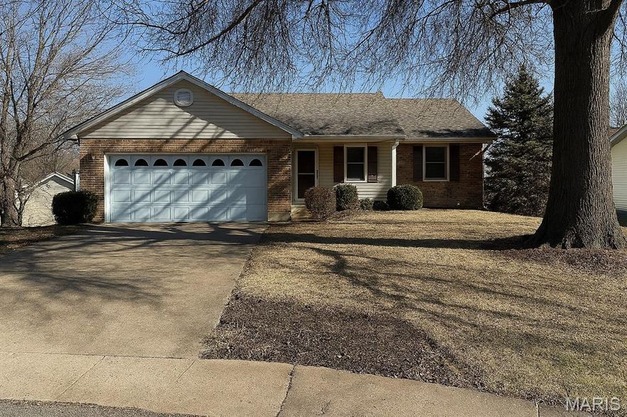 This beautifully updated, move-in-ready 4-bed, 3-bath home sits at the end of a quiet cul-de-sac near St. Francis Borgia High School. Recent updates include a newer roof and brand-new carpet. The main level offers hardwood floors, granite countertops, a main-floor primary suite, and main-floor laundry. Step out onto the spacious composite deck overlooking the peaceful backyard. The finished walkout basement adds a bedroom, full bath, generous storage, and excellent space for entertaining in the large family room.