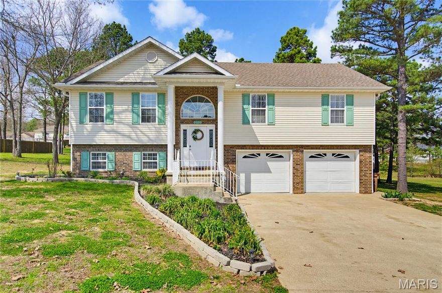 Build in 2014, this stunning split-level home blends thoughtful design with comfort and charm - the perfect place to gather, grow, and entertain.

Offering three spacious bedrooms (with potential for a fourth) and three full bathrooms, the layout is both flexible and functional.  The open, flowing floor plan creates an effortless connection between the living, dining and kitchen areas.  Natural light fills the space, highlighting the airy ceilings and creating an inviting atmosphere ideal for both everyday living and hosting guests.

The kitchen serves as the heart of the home - open to the main living area so conversations flow easily while meals are prepared.  Whether it's holiday dinners, study sessions, or casual family evenings, this space adapts beautifully.

Downstairs is conveniently designed with versatility in mind.  It can function as a private guest suite, a second living room, a home office, or even that fourth bedroom - complete with easy access to a full bath.  It's ideal for multi-generational living, teens needing their own retreat, or overnight visitors.

The spacious two-car garage goes above and beyond, offering ample room not only for vehicles but also for a workshop and generous storage.  Organized, practical, and ready for hobbies or projects.

Step outside and you'll discover a backyard designed for relaxation and celebration.  A charming gazebo anchors the outdoor space - perfect for summer dinners, quiet morning coffee, or evening gatherings under the stars.  The yard provides room to play, garden, or simply unwind.

The front lawn is maintained beautifully with a sprinkler system for easy upkeep, while thoughtfully placed exterior lighting - including up-lighting in the trees - add both security and elegance.  At night, the home glows warmly, creating a welcoming first impression for family and guests alike.

This is truly a home that embraces a variety of family sizes and lifestyles - offering space to spread out, room to entertain, and thoughtful details that make everyday living feel special.

Call me for your private showing of this lovely home today - 573.429.3243 or 573.785.7600