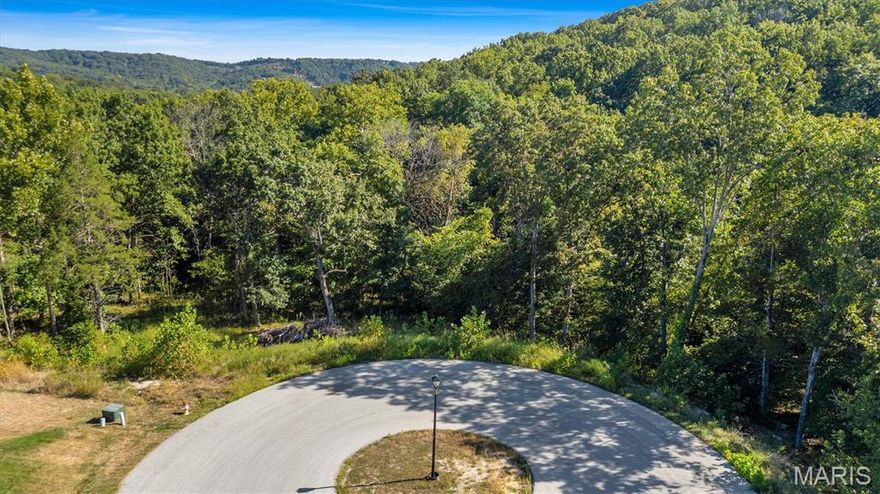 Your dream home begins here! Nestled in the highly sought-after Red Oak Valley subdivision, this 1.6+/- acre wooded lot offers the perfect blend of privacy and convenience. Imagine designing a custom home surrounded by trees, yet just minutes from everyday essentials and major highways (21, 30, M, 55 & 270).
This premium homesite is already equipped with public water, sewer, natural gas, high-speed internet, cable, asphalt roads, and streetlights, giving you the modern comforts you need in a scenic, serene setting. Sought after Seckman High School, Antonia Elementary & Middle, and builders will appreciate that site-specific custom plans are available to jumpstart your vision.
Don’t just buy land—create the lifestyle you’ve always imagined in a neighborhood that feels like home from the start. Site specific building plans are available!