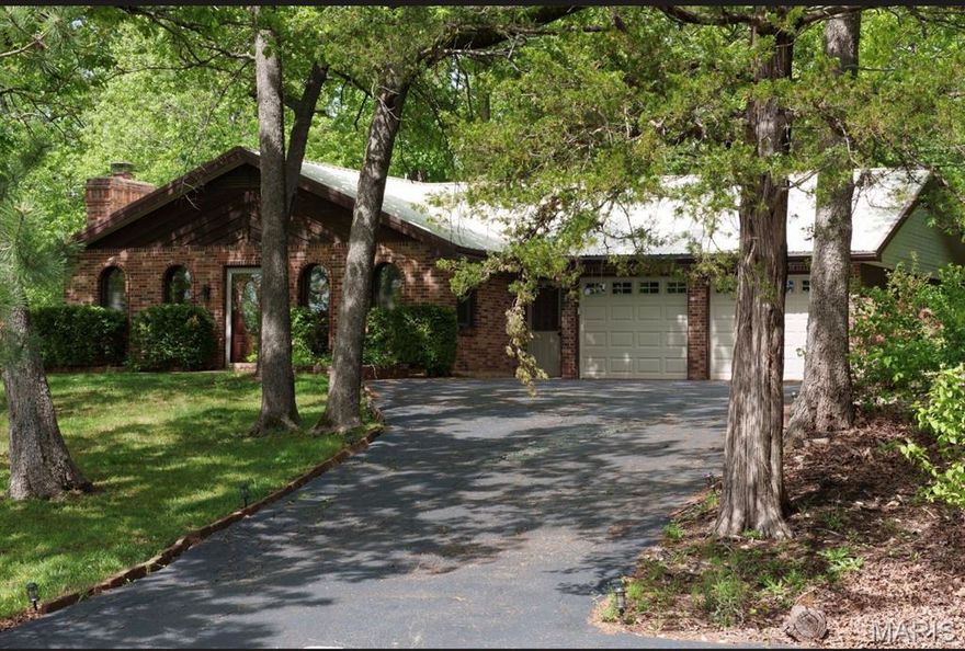 LAKEVIEW!!  OPEN HOUSE SATURDAY and SUNDAY!!  May 23 and 24th from 1-3!!  Stop by for a quick view! Lake living at its best—just steps from the beach and marina! This beautifully situated home offers breathtaking water views and is nestled on a private, wooded lot for the perfect blend of scenery and serenity.

Featuring 5 spacious bedrooms and 2 full bathrooms, this home provides plenty of room for family and guests. Enjoy cozy evenings by the fireplace while taking in stunning lake views.

Whether you’re relaxing on the property, heading to the beach, or enjoying the marina, this location offers the ultimate lake lifestyle. A rare opportunity to own a home where the views truly take center stage!