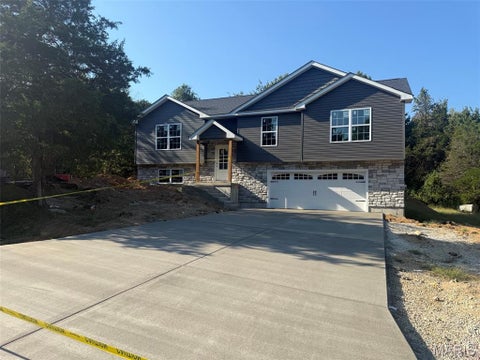 Photo of 210 Mulberry Lane, De Soto, MO 63020 (MLS # 26052797)