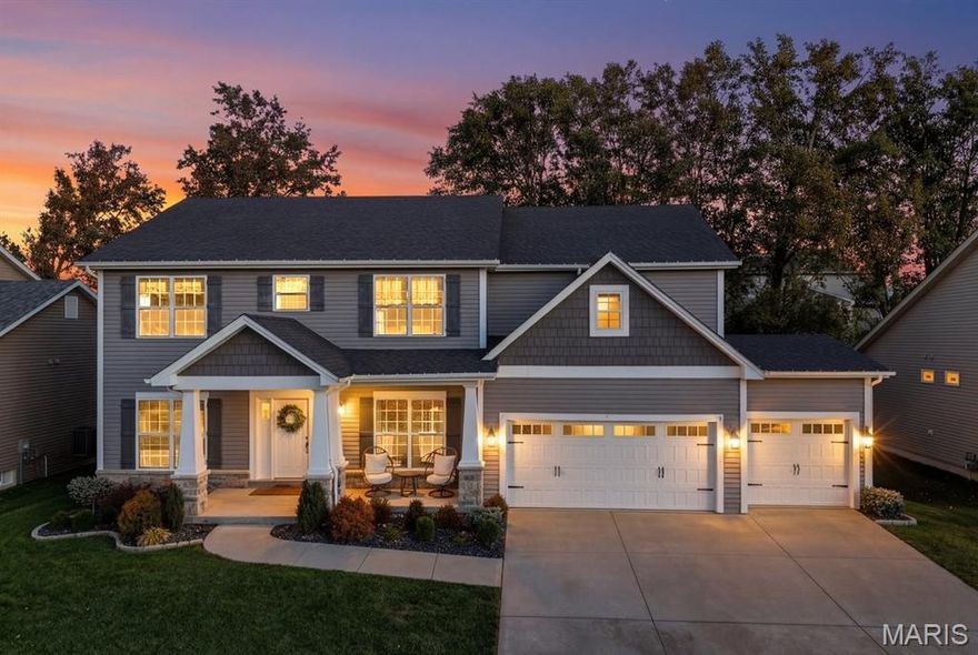 No need to wait for new construction when you can own this beautifully upgraded, 5-year-young McKelvey custom home in the sought-after Wyndemere community! Situated on a quiet cul-de-sac with no through traffic, this two-story Carlyle floor plan offers over 3,100 sq ft of stylish living space on a level, fully fenced lot with a spacious patio and irrigation system. Inside, the open-concept design features luxury vinyl plank flooring throughout (no carpet), tall baseboards, neutral paint, upgraded lighting, and two-panel doors. The expanded chef’s kitchen boasts an oversized island, quartz countertops, tiled backsplash, stainless steel appliances, built-in wall oven and microwave, plus a bright breakfast room. The living room showcases a gas fireplace, custom accent wall, and a wall of windows. A formal dining room, office with barn doors, laundry room with built-in cubbies, and powder room complete the main level. Upstairs, the primary suite offers a walk-in closet and spa-like bath with dual vanities, soaking tub, glass shower, and private water closet. A large loft leads to three additional bedrooms and a full bath. The unfinished basement adds 1,300+ sq ft with a bath rough-in and egress window for future expansion.