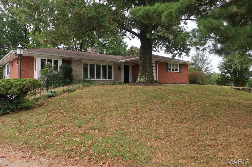 Check out this brick & stone custom built gem! You won't find this in a standard new-build subdivision today. There are a lot of upgraded features in the home, such as casement windows, solid surface counter top, wood floors, etc... And since it is sitting on a 1/2 acre with great exposure on Old Hwy 21, it could lend itself to be a terrific location for an in-home business, such as a salon, tax service, real estate office, dog grooming, etc... Before you buy, be sure to check this one out as we are sure it will surprise you.