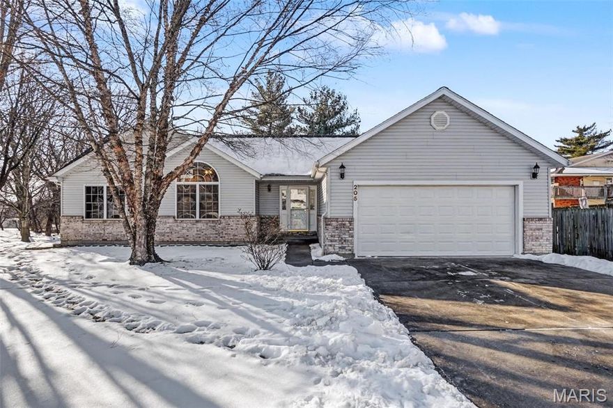 Welcome home to 205 Adams Court! Tucked away at the end of a quiet cul-de-sac, this charming one-owner ranch is the definition of move-in ready. From the moment you step inside, you’ll notice the crisp, fresh feel of brand-new paint throughout the entire home and plush new carpeting in each room, offering a perfect blank canvas for your personal style. The heart of the home is the impressive great room, where soaring vaulted ceilings create an airy, open feel and a cozy fireplace serves as the perfect centerpiece for relaxing evenings.

Just off the great room, the functional galley kitchen features oak panel cabinetry and a pantry for plenty of storage. The layout flows right into a sunny breakfast nook, which offers easy access to the back patio. For ultimate convenience, the main floor laundry closet is situated between the kitchen & garage, making chores a breeze. Even your guests will feel the serenity of the home in the spacious spared bedrooms, one of which boasts its own beautiful vaulted ceiling.

The primary bedroom suite features "his-and-hers" walk-in closets and a private ensuite bathroom complete with a double vanity, separate shower, private water closet, and jet tub. Beyond the front door, the location is unbeatable! This home is just a block from the public library and only minutes from the city pool, local park, shopping, and schools. Built in 2003 but with just one owner, this home is ready to welcome its next chapter with you. Come see why this quiet corner of the neighborhood is the perfect place to plant your roots!