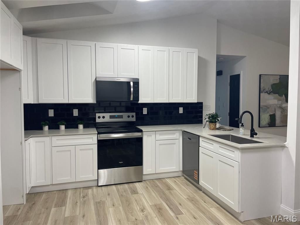 Photo of 833 Whitney Circle, Herculaneum, MO 63048 (MLS # 25073079)