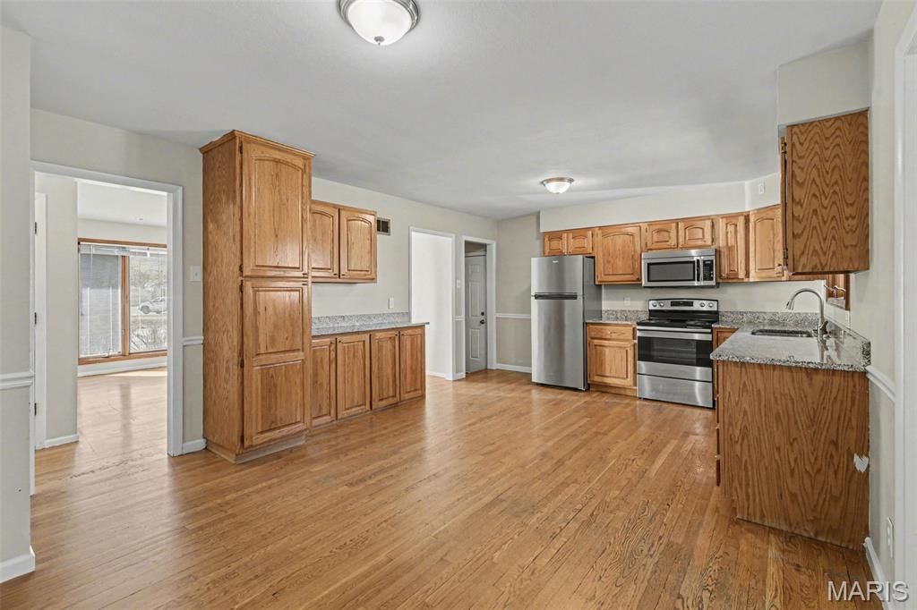 Photo of 1125 Florland Drive, Florissant, MO 63031 (MLS # 26013616)