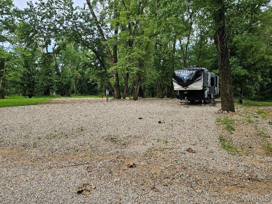Two adjoining camping lots in a private gated campground that has large, private, beautiful gravel bars with Current River access.   Whether it is you or you and your family this campground offers a secure, family friendly atmosphere, with shade trees, and privacy.  The lots have city water, sewer and electric already on them and are move in ready.  They are located at one of the higher areas of the campground.  A private boat ramp is also located in the campground for your use.  This campground is located in city limits just north of the Current River bridge.  You can throw some hot dogs on the bbq grill while at the gravel bar, catch some rays, splash in the crystal clear water, then retire to an evening of relaxation at your own private camping lots.  There is plenty of room and utilities to construct your own private pavilion on your lots for those rainy days or when the sun is blasting.