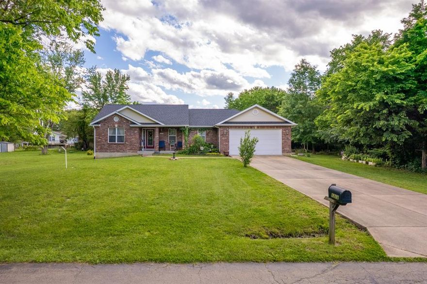 When an opportunity like this comes up, you don't want to wait. This spacious and well-kept 3 bedroom/2 bath, in Festus R6 School district sits on a level 1.6+/- acre lot! Welcome yourself home via the covered front porch to the entry foyer with a dedicated office space(not included in bedroom count). Open living spaces with a divided floorplan bring 3 large bedrooms, one being a master on suite with separate jacuzzi tub and walk in shower, double vanity and walk-in closet. The functional kitchen, with breakfast bar seating, overlooks the dining are nook. Cozy up by the fireplace while you look out your French doors to the partially covered back deck and level yard. Main floor laundry with cabinetry and a folding/storage area sit conveniently off the garage access to the home. Thinking of gardening? Raised beds stay with the home and the entire second, wooded lot is yours to do as you please! Lower level has a legal egress window to provide a 4th bedroom and plenty of space to finish for even more living area.