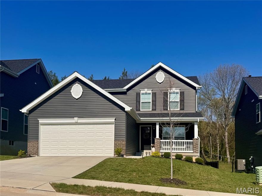 No need to wait to build with this 2 year old home! Gorgeous and turn key move in ready home! 2 Story 3 bed 2.5 bath with 2 car garage. You’ll love the covered front porch, window sill height brick, and darker siding. Like new this home features luxury vinyl plank flooring, kitchen with island and just a few steps to patio. Entertain and enjoy this large kitchen with breakfast room and dining room option. 2nd floor laundry! Primary bedroom suite with walk in closet and bathroom with shower, two additional bedrooms and full bathroom. The basement is open and ready for the finishing touches! Level yard backs to wooded view! Close to schools, shopping, and restaurants! Hurry, Home!