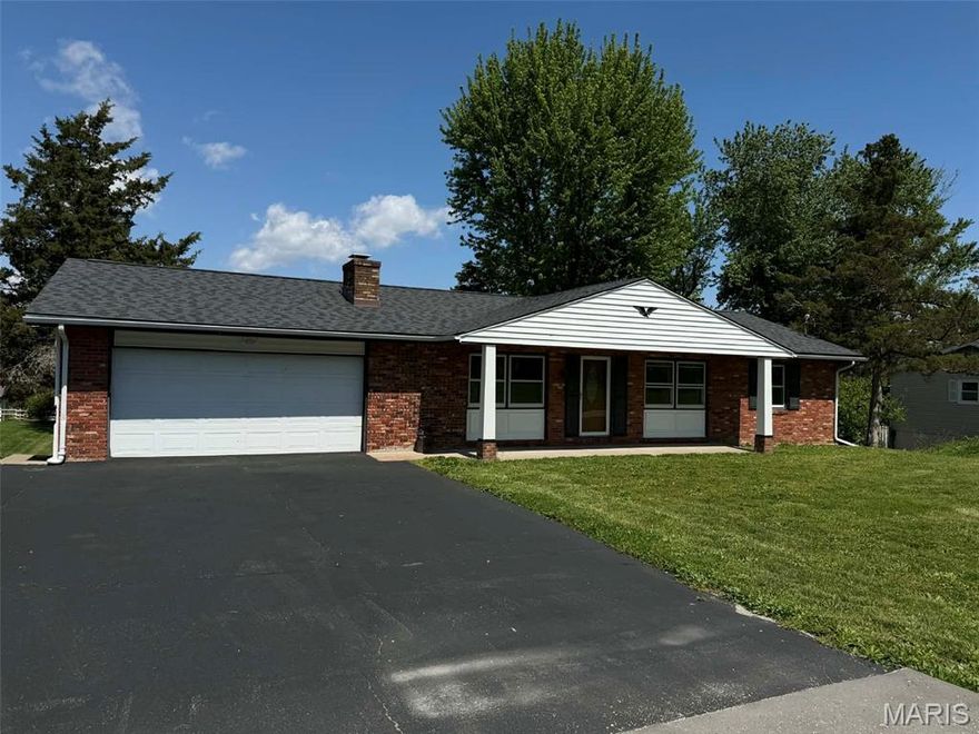 Spacious 3 bedroom, 2.5 bath home with a large backyard and storage shed. The main level features a cozy gas fireplace, a primary bedroom with primary suite, two additional bedrooms, a large eat-in kitchen and plenty of dining space. Step outside onto the deck overlooking the backyard — perfect for relaxing or entertaining. The finished lower level offers endless potential with a kitchenette, half bath, expansive family/rec room space, and abundant storage. Additional updates include a new roof in 2024. Conveniently located with plenty of space inside and out, this home offers comfort, functionality, and room to make it your own.
