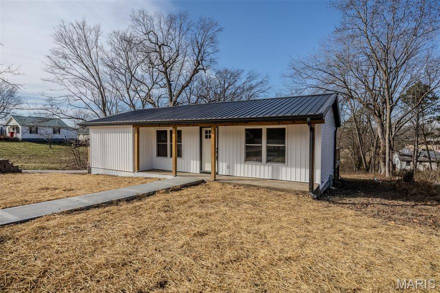 Full In Law Apartment! Completely renovated and restored! Unique multi-family/ generational/ mixed-use property in the heart of historic downtown small town America.

Nestled neatly in walking distance between downtown local shops and businesses and the local school district.

The town is conveniently placed within a short commute to both the Fort Leonard Wood training base and the bustling Lake of The Ozarks recreation areas.

New electric, plumbing, HVAC, insulation, and finishes throughout every inch of the property. The upstairs of this .5 acre +/- property features 3 beds/2 baths and a redesigned master suite with a private deck, a custom kitchen with double ovens and a walk-in pantry.

The basement was reimagined to recreate a separate dwelling unit/ studio apartment in the walkout basement with a separate entrance and driveway to use as additional income or space to expand. Property is Agent Owned.