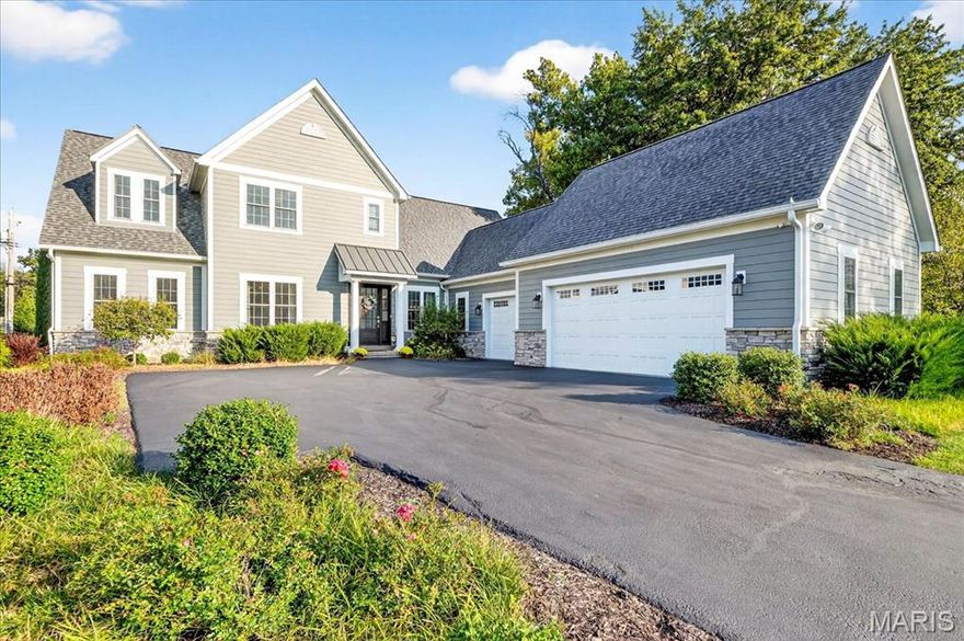 Tucked away on a private cul-de-sac, this exceptional custom-built home blends modern elegance with everyday comfort—all just steps from Ladue & Frontenac shops, restaurants, and schools. Built in 2021, it offers a bright, airy layout with soaring ceilings and thoughtful craftsmanship across three finished levels. The heart of the home is the gourmet kitchen, featuring high-end finishes and stainless steel appliances including a built-in ice maker and microwave. The spacious breakfast room has an effortless flow into the inviting great room with its cozy fireplace. The designer light fixtures throughout add a touch of sophistication to the home. The main floor primary suite is truly a retreat, featuring a luxurious spa-style wet room with multiple shower heads and sprayers, dual vanities and two generous walk-in closets. The bathroom is enhanced by illuminated mirrors, abundant natural light, and a serene atmosphere that elevates the everyday routine into a spa-like experience. The main floor also offers a private office or additional bedroom with closet. Upstairs, you’ll find a spacious ensuite bedroom plus two additional rooms joined by a stylish Jack and Jill bath. The lower level is designed for fun and functionality—complete with a media lounge, fitness area, and an impressive bar with custom shelving, beverage cooler, and an additional built-in dishwasher & ice maker! The spacious 3-car heated garage features an epoxy floor and high-amp Tesla charger. Additional highlights include two water heaters, two zoned heating and air conditioning units, and a security system already installed and ready for activation. Outside, you’ll find the beautifully maintained landscaping and irrigation system. A perfect blend of style, quality, and location, this stunning home is move-in ready!