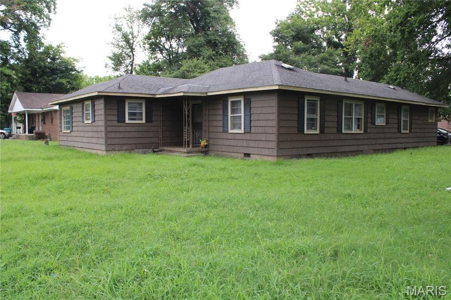 3 Bedrooms, 2 bath home located on a corner lot. Lots of living space for the family. Good home for your family. Also could be great investment property. Currently rented. Loan pre-qualification letter or proof of funds required for showings.   May be purchased as part of an investment package. Ask the listing agent for details. Lot Size 100X132.