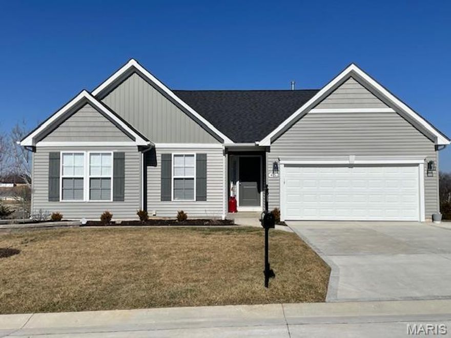 Why wait to build when you can purchase this move-in ready home completed in May of 2025! Instead, enjoy your spring & summer & relax in your like-new home! This 3-bedroom, 2 full bath, split bedroom floor plan comprises approx. 1840 sq. ft. on the main level which is larger than most new homes with similar room count and a larger than average lot of over half an acre!  Plus, the lower-level walk-out has a finished recreation room and full bath with shower.  The unfinished area has an egress window and plenty of additional space for storage or to finish as you wish for your next endeavor.  Additional touches added by the Seller include a third concrete parking pad, epoxy finish on garage floor, patio across back of home, water softener, plantation window treatments, burying downspouts & cabinet hardware. Sodded yard and landscaping have been established.  Vaulted entry foyer and great room. 42" kitchen wall cabinets with crown molding, quartz countertops and stainless-steel Whirlpool appliances. This home has many features designed for your enjoyment!