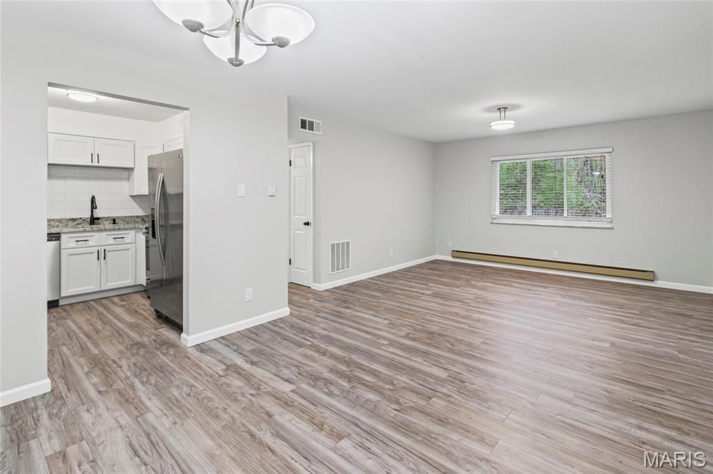 Photo of 10135 Sakura Drive #G, St Louis, MO 63128 (MLS # 26019407)