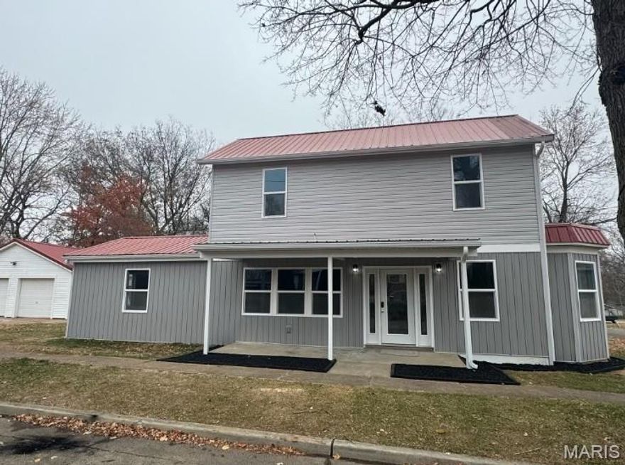 Move-in-ready and fully remodeled from top to bottom! This bright three-bed, 2.5-bath home sits in a quiet, family-friendly neighborhood and features all-new drywall, paint, doors, trim, flooring, siding, gutters, and energy-efficient LowE/Argon windows.

A complete electrical upgrade includes new in-wall wiring, a 200-amp panel, updated outlets and switches, and LED flush-mount lighting throughout. Comfort shines with a new mini-split system offering six individually controlled zones plus ceiling fans in every bedroom.

The spacious kitchen delivers a butcher-block island, granite countertops, a walk-in pantry with cabinetry, and new Samsung stainless steel appliances. You’ll also love the dedicated laundry room with sink, new 50-gallon water heater, and fully updated plumbing.

The primary suite features a walk-in closet and custom walk-in shower. Upstairs are two generous bedrooms and a beautifully updated full bath. A two-car detached garage with electrical completes this all-electric home.
Every upgrade is done — just move in and enjoy.  Schedule your showing today!!